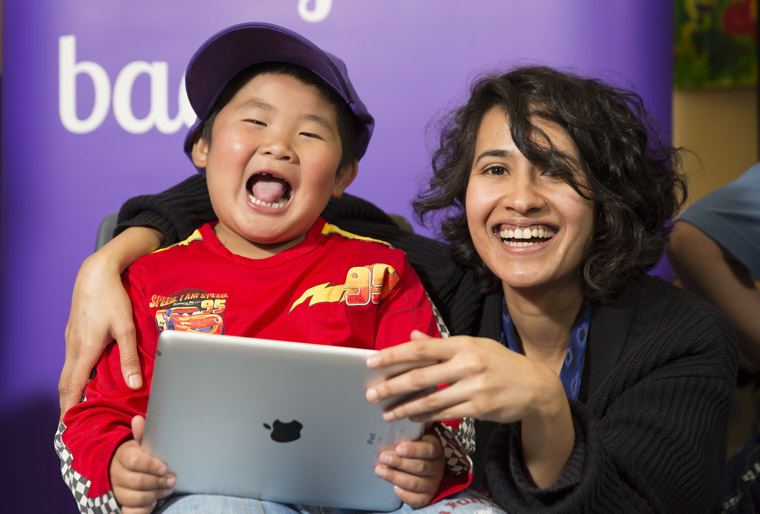 A child who benefitted from a crowd-funded project to buy iPads for children with disabilities
