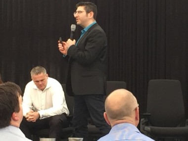 Philip Ross on stage, Will Walker (seated)