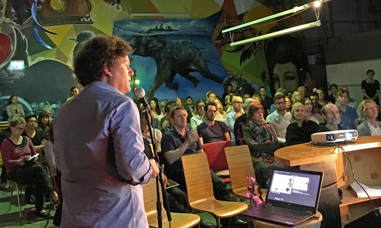 Josh Byrne addressing the baugruppen information night crowd