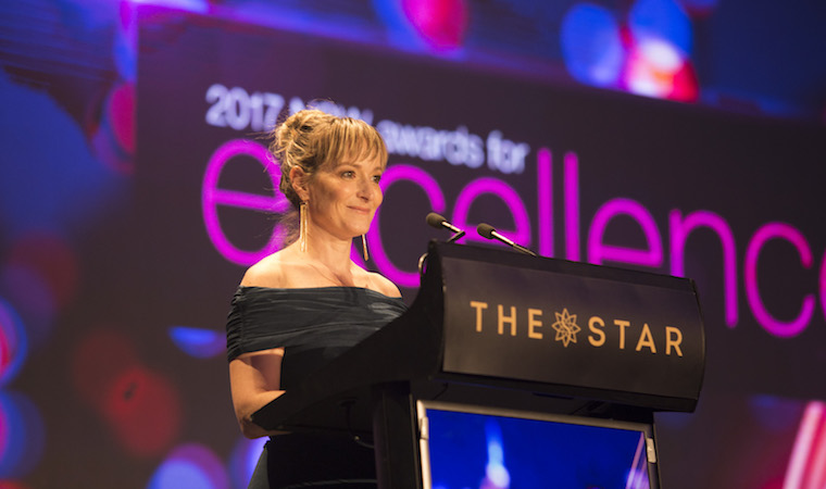 Esti Cogger receiving award at NAWIC awards 2017