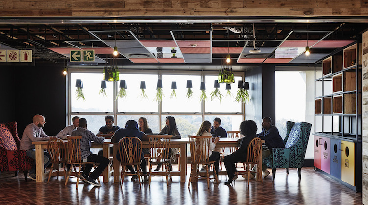 sustainability crowd, sitting around table
