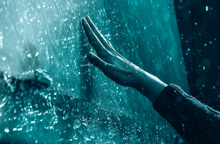 blue hand touching the future