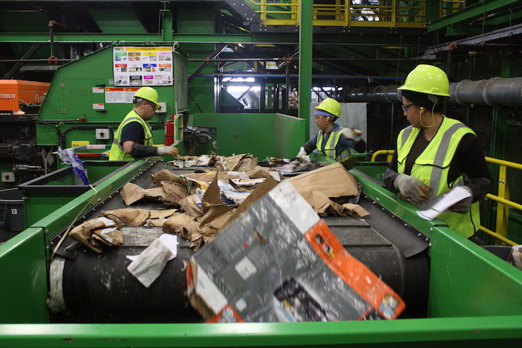 workers sorting recycling