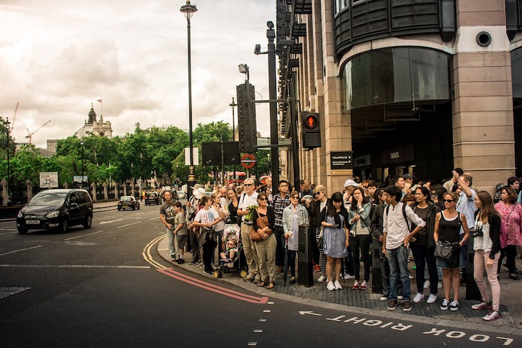 group standing at lights uk construction