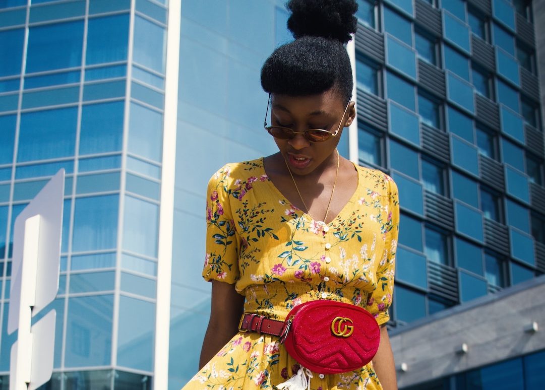 woman in yellow dress and Gucci bag