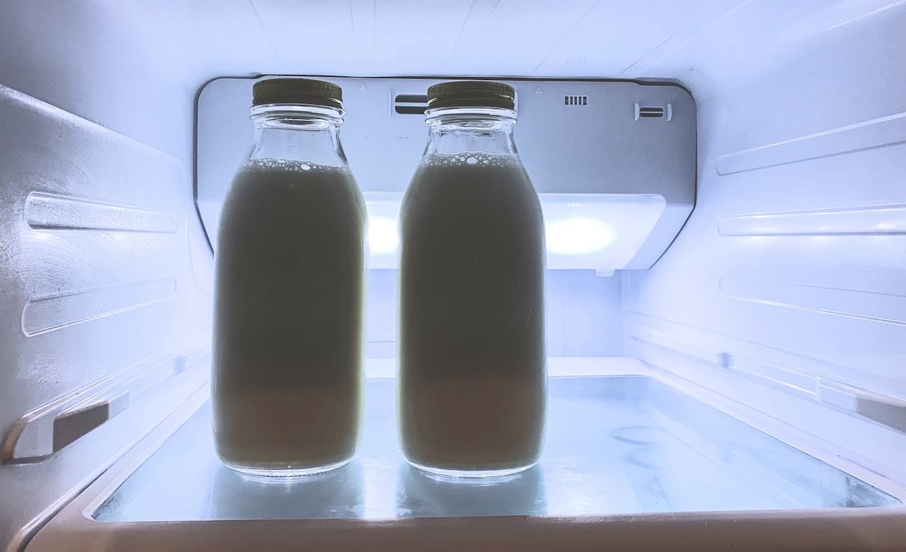 milk bottles in fridge