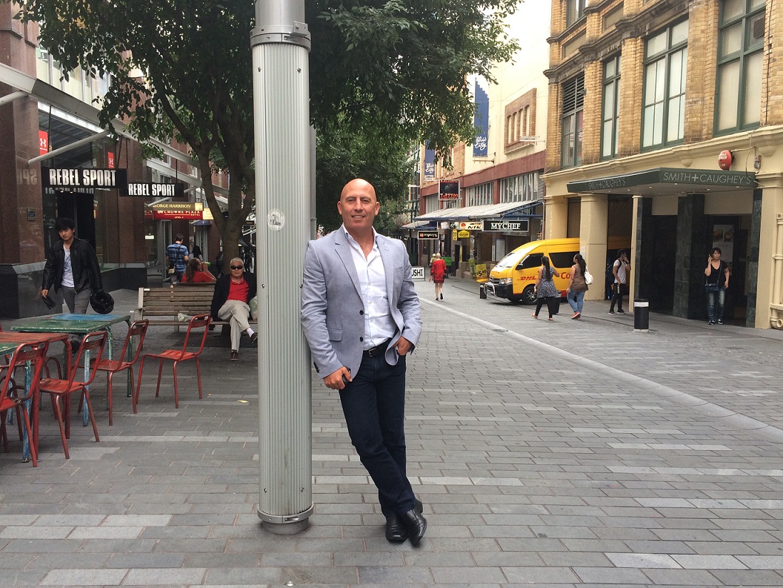 man standing in street