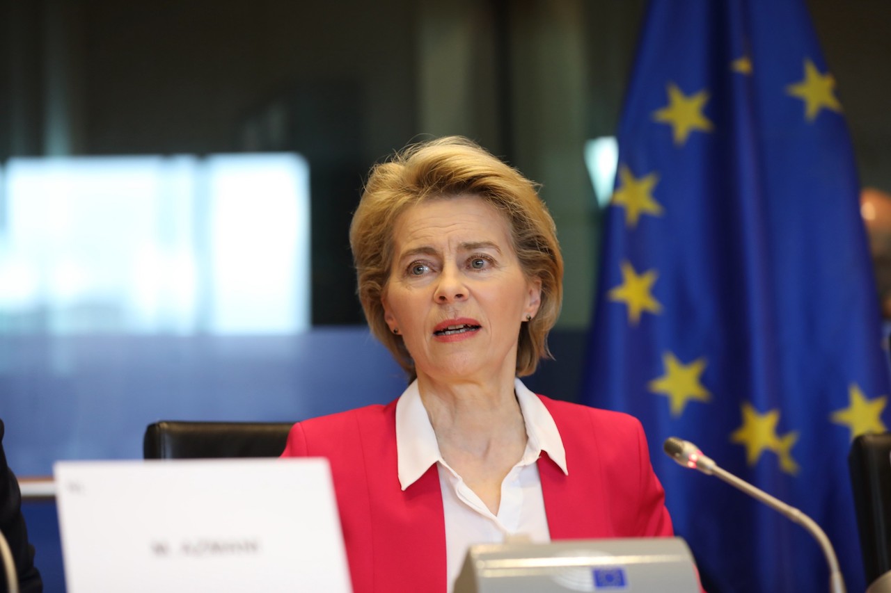 women speaking at event
