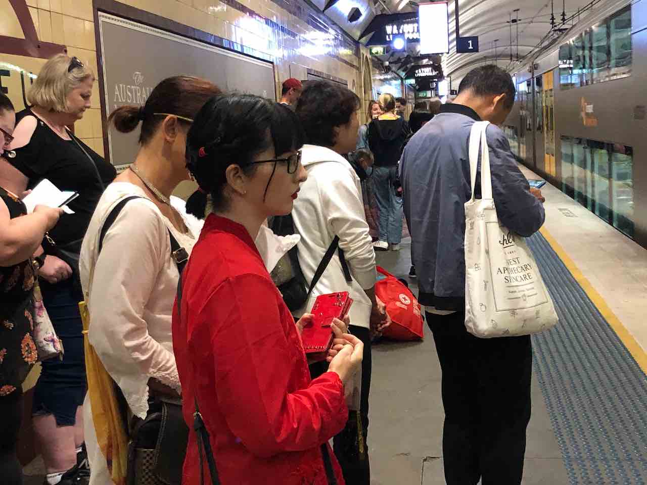 people at train station