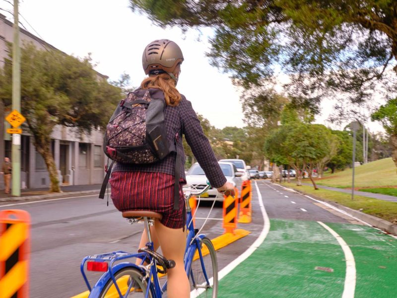 woman cycling on sydney roads