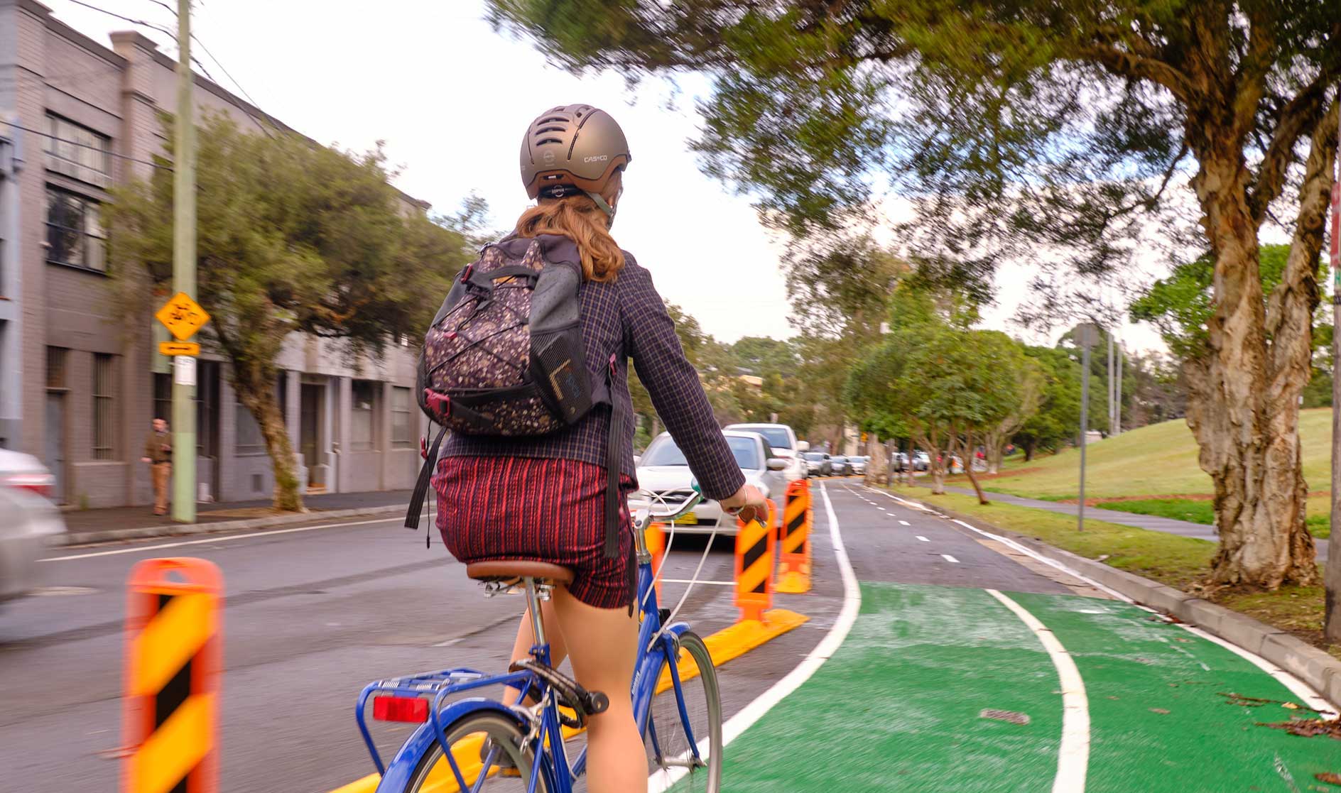 woman cycling on sydney roads