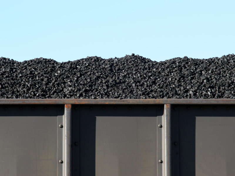coal in train boxcar awaiting transport