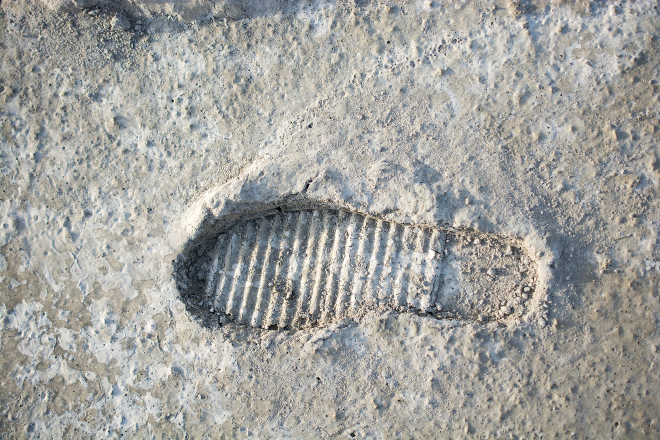 Footstep pattern seen on a concrete background