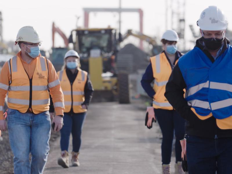 Construction workers wearing masks
