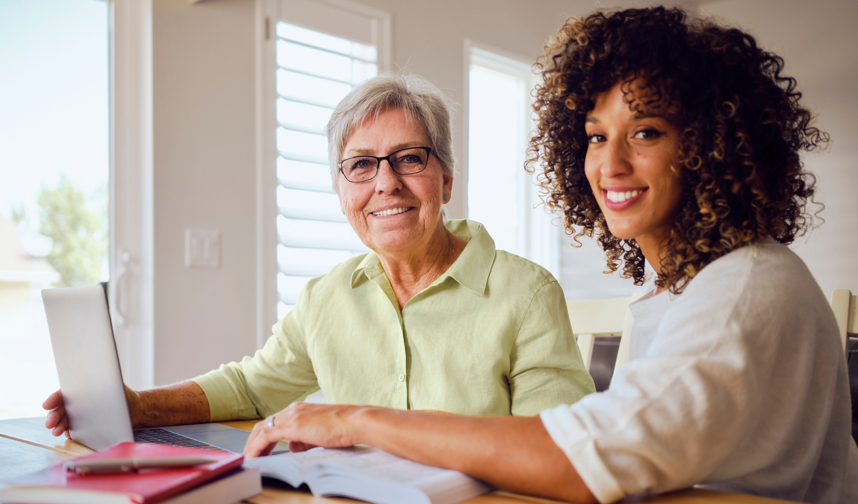 Younger and older woman at computer
