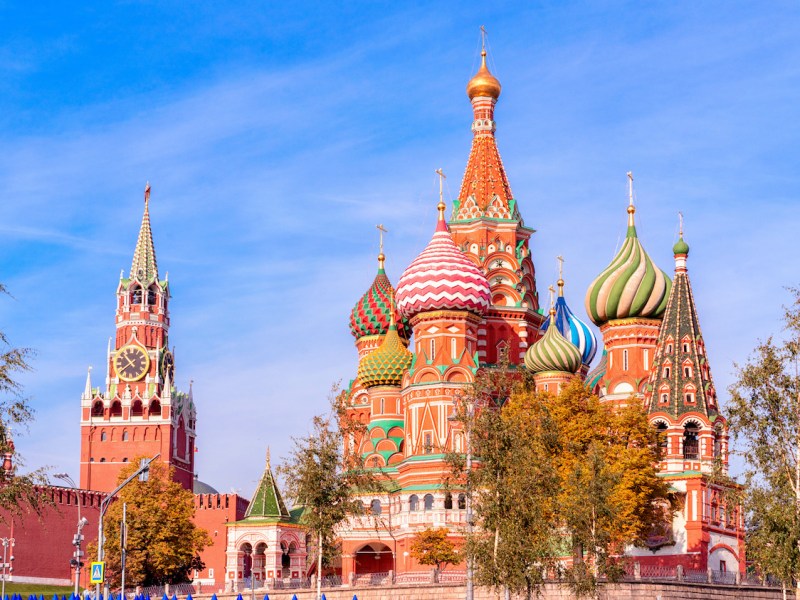 Spasskaya Tower, the Moscow Kremlin and St. Basil's Cathedral. Architecture and sights of Moscow.