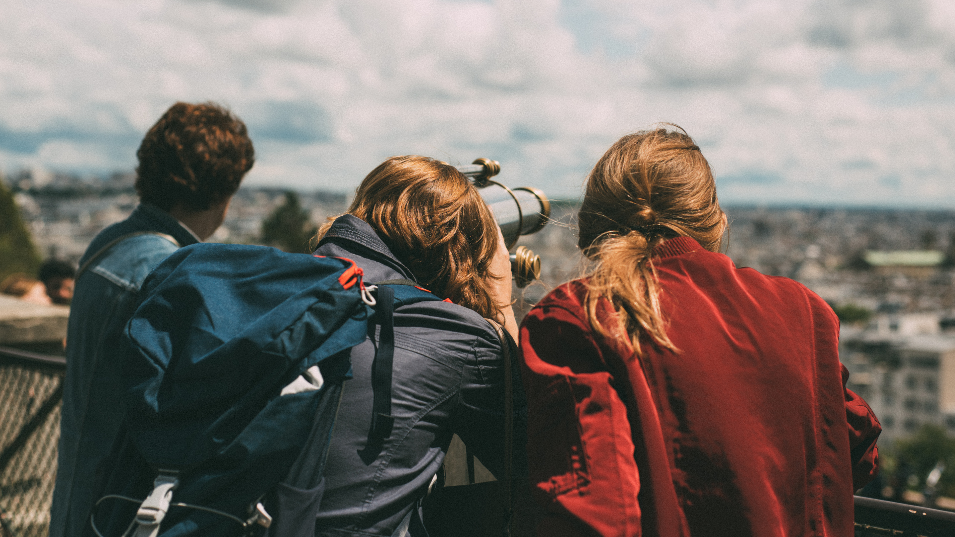 friends looking through binoculars