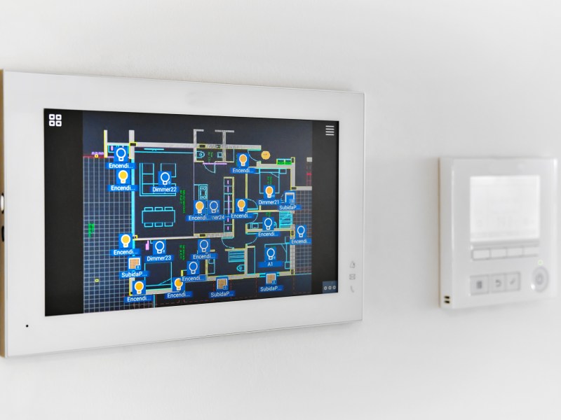 Concept of automation system smart modern luxury wealthy home mounted on white wall close up, no people